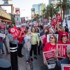 Members of the Culinary Workers Union, Local 226, picket outside Paris Las Vegas before a Culinary Union civil disobedience protest on the Las Vegas Strip Wednesday, Oct. 25, 2023. The union is currently in contract negotiations with the casinos. Seventy-five people were arrested after blocking part of Las Vegas Boulevard.