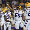 LSU wide receiver Malik Nabers (8) celebrates his touchdown reception with teammates in the second half of an NCAA college football game against Army in Baton Rouge, La., Saturday, Oct. 21, 2023. LSU won 62-0.