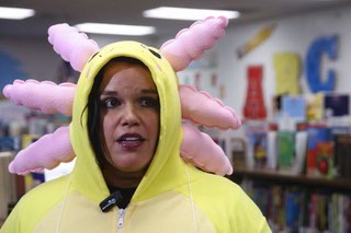 Fifth grade teacher Beth Barber, dressed as an Axolotl for Halloween, speaks during an interview at Clarence Piggott Academy of International Studies Tuesday, Oct. 31, 2023.