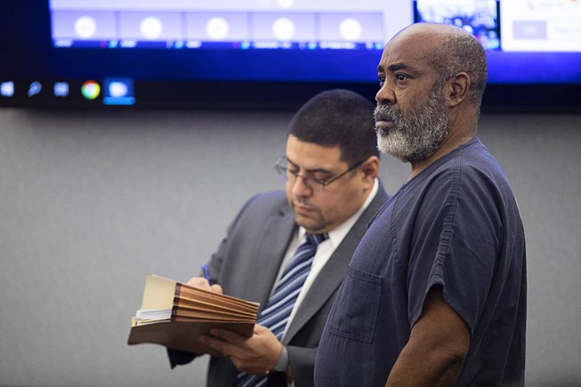 Defense attorney Robert Arroyo, left, stands by Duane Keith "Keffe D" Davis as Davis makes an appearance in Clark County District Court Tuesday, Nov. 7, 2023, in Las Vegas. Davis was arrested in September and has pleaded not guilty to murder in the 1996 killing of rapper Tupac Shakur.