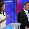 Republican presidential candidate former U.N. Ambassador Nikki Haley speaks as Florida Gov. Ron DeSantis listens during a Republican presidential primary debate hosted by NBC News, Wednesday, Nov. 8, 2023, at the Adrienne Arsht Center for the Performing Arts of Miami-Dade County in Miami.