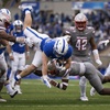 Air Force running back Owen Burk (26) is tackled by UNLV defensive back Cameren Jenkins (13) during the first half of an NCAA college football game, Saturday, Nov. 18, 2023, at Air Force Academy, Colo.