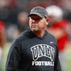 UNLV Rebels head coach Barry Odom stands on the field before a college football game against the San Jose State Spartans at Allegiant Stadium Saturday, Nov. 25, 2023.