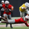 UNLV Rebels defensive back Jett Elad (9) tackles San Jose State Spartans running back Kairee Robinson (32) during the first half of a college football game at Allegiant Stadium Saturday, Nov. 25, 2023.