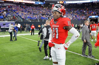 UNLV wide receiver Ricky White (11) stands in the field after UNLVs 44-20 loss to Boise State in the Mountain West championship football game at Allegiant Stadium Saturday, Dec. 2, 2023.
