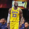 Los Angeles Lakers forward LeBron James (23) smiles after being fouled while shooting against the New Orleans Pelicans during the first half of a semifinal in the NBA basketball In-Season Tournament, Thursday, Dec. 7, 2023, in Las Vegas. 
