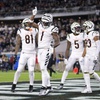 Cincinnati Bengals wide receiver Ja'Marr Chase (1) celebrates in the end zone after scoring a touchdown on a pass play during the second half of an NFL football game against the Jacksonville Jaguars, Monday, Dec. 4, 2023, in Jacksonville, Fla.