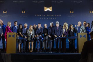 Officials representing the Fontainebleau Las Vegas cut a ribbon during the casinos opening day ceremony Wednesday, Dec. 13, 2023.
