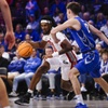 UNLV Rebels forward Keylan Boone (20) moves the ball against Creighton Bluejays forward Mason Miller (13) during the first half of a college basketball game at The Dollar Loan Center in Henderson Wednesday, Dec. 13, 2023.
