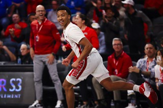 UNLV Rebels guard D.J. Thomas (11) smiles after he scoring against the Creighton Bluejays during the second half of a college basketball game at The Dollar Loan Center in Henderson Wednesday, Dec. 13, 2023.