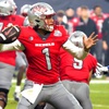 UNLV quarterback Jayden Maiava (1) throws down field against Kansas during the first half of the Guaranteed Rate Bowl NCAA college football game Tuesday, Dec. 26, 2023, in Phoenix.