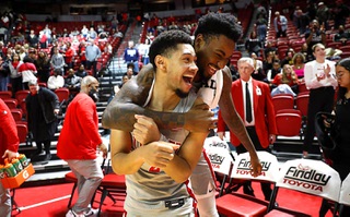 UNLV Rebels guard Justin Webster, left, and forward Kalib Boone (10) celebrate after their win over the Carroll Fighting Saints in an exhibition game at the Thomas & Mack Center Sunday, Dec. 31, 2023. STEVE MARCUS