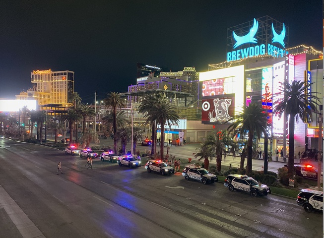 The Las Vegas Strip, under heavy coverage from Metro Police, is shuttering to vehicle traffic to make way for revelers to celebrate New Year's Eve, Dec. 31, 2023.