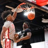 UNLV Rebels forward Rob Whaley Jr. (5) dunks in front of Bethesda University Flames forward Jonathan Ileleji (10) during an exhibition game at the Cox Pavilion Tuesday, Jan. 2, 2024.