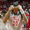 UNLV Rebels forwards Kalib Boone, left, and Keylan Boone (20) leave the court after an 87-86 loss to the Utah State Aggies at the Thomas & Mack Center Saturday, Jan.13, 2024. 
