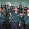 Taiwanese Vice President Lai Ching-te, also known as William Lai, center, celebrates his victory with running mate Bi-khim Hsiao, right, and supporters in Taipei, Taiwan., Saturday, Jan. 13, 2024.