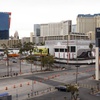People walk down Flamingo Rd where a temporary bridge built for the Formula 1 race has been removed Wednesday, Jan. 31, 2024.
