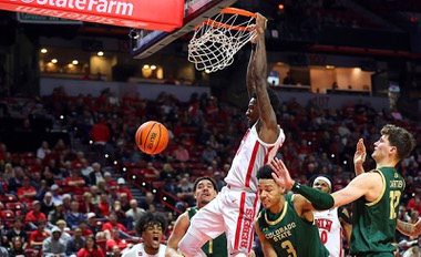 UNLV Rebels forward Kalib Boone (10) dunks the ball during the first half of an NCAA basketball game against the Colorado State Rams at the Thomas & Mack Center Saturday, Feb. 24, 2024.