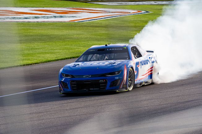 NASCAR Kyle Larson (5) celebrates with a burnout after winning the NASCAR Cup Series auto race at the Las Vegas Motor Speedway Sunday, March 3, 2024. BRIAN RAMOS