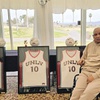 UNLV basketball great and longtime broadcaster Robert Smith sits in the Boulder Creek Golf Club clubhouse next to framed jerseys featuring his No. 10 from his playing days with the Rebels. The jerseys were prizes for winners participating in a golf tournament and birthday celebration for Smith, who turned 69 on Sunday, March 10, 2024. The golf tournament proceeds will help Smith with expenses for physical therapy, which he continues to undergo after suffering a stroke five years ago.