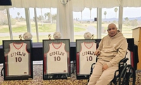 Robert Smith sits at a table at the Boulder Creek Golf Club with a half-eaten pulled pork sandwich and baked beans in front of him. Smith, the UNLV basketball great and member of the Rebels’ 1977 Final Four team, is posing for photos and greeting visitors — even if it means ...