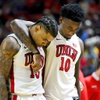UNLV Rebels forward Kalib Boone (10) consoles guard Luis Rodriguez (15) after a 74-71 loss to San Diego State Aztecs in overtime of an NCAA college basketball game in the quarterfinal round of the Mountain West Conference tournament at the Thomas & Mack Center Thursday, March 14, 2024. 