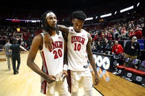 UNLV Rebels forwards Keylan Boone (20) and Kalib Boone (10) leave the court after a 74-71 loss to San Diego State Aztecs in overtime of ...