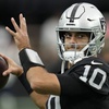 Las Vegas Raiders quarterback Jimmy Garoppolo (10) warms up before an NFL football game against the New England Patriots, Sunday, Oct. 15, 2023, in Las Vegas.