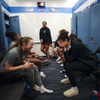 The UNLV Lady Rebels laugh in the locker room at UCLA’s Pauley Pavilion Friday, March 22, 2024, in Los Angeles.