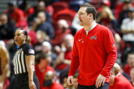 UNLV Rebels head coach Kevin Kruger calls out to players during the first half of an NCAA basketball game against the Boston College Eagles in the second round of the NIT tournament at the Thomas & Mack Center Sunday, March 24, 2024.