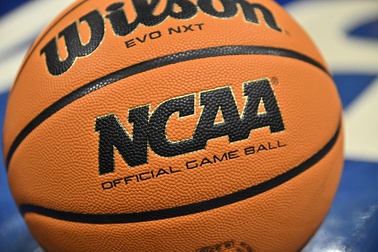 An official game ball sits on the court during the second half of an NCAA college basketball game between Southern California and UCLA in the semifinals of the Pac-12 tournament Friday, March 8, 2024, in Las Vegas.