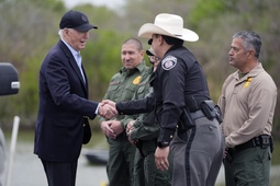 President Joe Biden talks with the U.S. Border Patrol and local officials as he looks over the southern border, Feb. 29, 2024, in Brownsville, Texas, along the Rio Grande. Democrats are trying to outflank Republicans and convince voters they can address problems at the U.S. border with Mexico as immigration likely becomes a major issue in elections that will decide control of Congress.