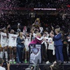 South Carolina players and coaches celebrate after the Final Four college basketball championship game against Iowa in the women's NCAA Tournament, Sunday, April 7, 2024, in Cleveland. South Carolina won 87-75.


