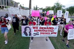 Thousands of protesters march around the Arizona Capitol in protest after the Supreme Court decision to overturn the landmark Roe v. Wade abortion decision Friday, June 24, 2022, in Phoenix. A stunning abortion ruling this week in April 2024, has supercharged Arizona’s role in the looming fall election.


