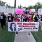 Photo: Thousands of protesters march around the Arizona C