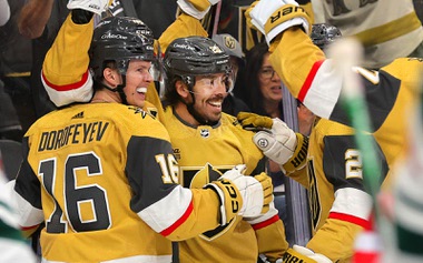 Vegas Golden Knights players celebrate a goal by Tomas Hertl during the third period of an NHL hockey game against the Minnesota Wild at T-Mobile Arena Friday, April 12, 2024.