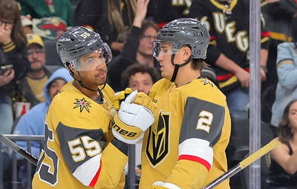 Vegas Golden Knights right wing Keegan Kolesar (55) is congratulated by Zach Whitecloud (2) after scoring against the Minnesota Wild during the third period of an NHL hockey game at T-Mobile Arena Friday, April 12, 2024.