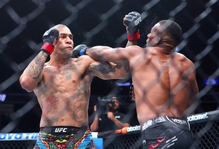 UFC light heavyweight champion Alex Pereira, left, knocks down Jamahal Hill in the first round of a title fight during UFC 300 at T-Mobile Arena Saturday, April 13, 2024, in Las Vegas. Pereira retained his title by first-round TKO.