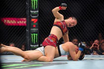 UFC Women’s strawweight champion Zhang Weili punches Yan Xiaonan in a women’s title fight during UFC 300 at T-Mobile Arena Saturday, April 13, 2024, in ...