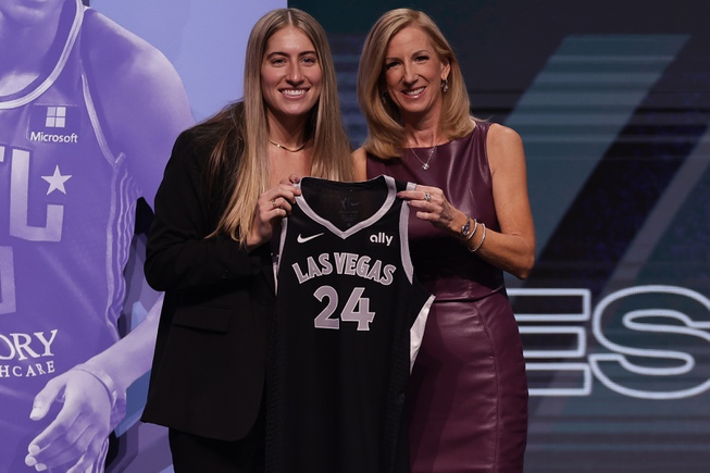 Iowa's Kate Martin, left, poses for a photo with WNBA commissioner Cathy Engelbert, right, after being selected 18th overall by the Las Vegas Aces during the second round of the WNBA basketball draft on Monday, April 15, 2024, in New York. 


