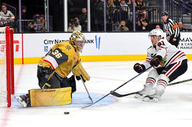 Vegas Golden Knights goaltender Logan Thompson (36) defends against Chicago Blackhawks center Frank Nazar (91) during the second period of an NHL hockey game at T-Mobile Arena Tuesday, April 16, 2024.