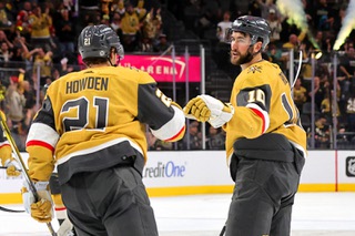 Vegas Golden Knights center Brett Howden (21) congratulates center Nicolas Roy (10) after Roy’s empty net goal during the third period of an NHL hockey game at T-Mobile Arena Tuesday, April 16, 2024.