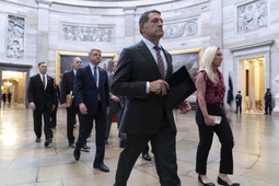 House Impeachment Managers from left, Rep. Michael Guest, R-Miss., Rep. Andy Biggs, R-Ariz., House Foreign Affairs Committee Chairman Michael McCaul, R-Texas, House Committee on Homeland Security Chairman Mark Green, R-Tenn., and Rep. Marjorie Taylor Greene, R-Ga., walk cross the Capitol Rotunda to the Senate chamber to deliver Homeland Security Secretary Alejandro Mayorkas' Impeachment Articles at the Capitol in Washington, Tuesday, April 16, 2024.


