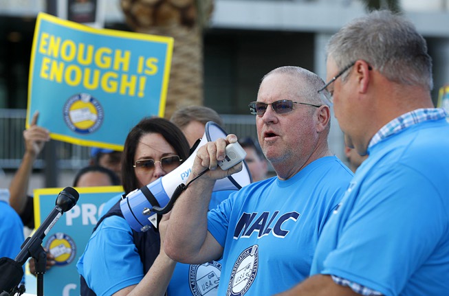 Letter carrier Michael Roksvold speaks during a demonstration by letter carriers in front of the Lloyd George Federal Building in downtown Las Vegas Wednesday, April 17, 2024. Roksvold told of his experience of having his postal vehicle carjacked at gunpoint.