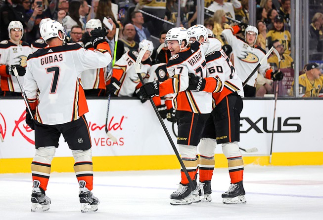 Anaheim Ducks right wing Frank Vatrano, center, celebrates with teammates after scoring an empty net goal during the third period of an NHL hockey game against the Vegas Golden Knights at T-Mobile Arena Thursday, April 18, 2024.