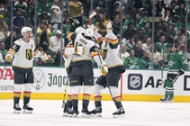 Vegas Golden Knights’ Noah Hanifin (15) celebrates with Mark Stone (61), Tomas Hertl, front right, and Jack Eichel, left, after Stone scored in the first ...