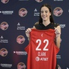 Indiana Fever's Caitlin Clark holds her jersey following a WNBA basketball news conference, Wednesday, April 17, 2024, in Indianapolis. 