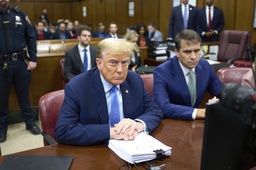 Former President Donald Trump appears at Manhattan criminal court before his trial in New York, Friday, April 26, 2024. 