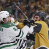 Vegas Golden Knights right wing Mark Stone (61) fights with Dallas Stars defenseman Miro Heiskanen (4) during the first period in Game 4 of an NHL hockey Stanley Cup first-round playoff series at T-Mobile arena Monday, April 29, 2024.