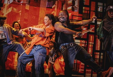 This image released by Polk & Co. shows Maleah Joi Moon, left, and Chris Lee during a performance of "Hell's Kitchen." 